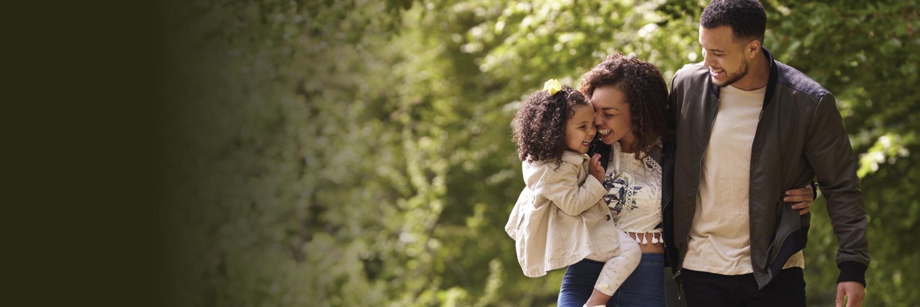 Family walking in the woods | Dental Emergencies Greeley, CO