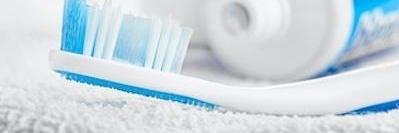 Toothbrush and toothpaste at Greeley dentist office